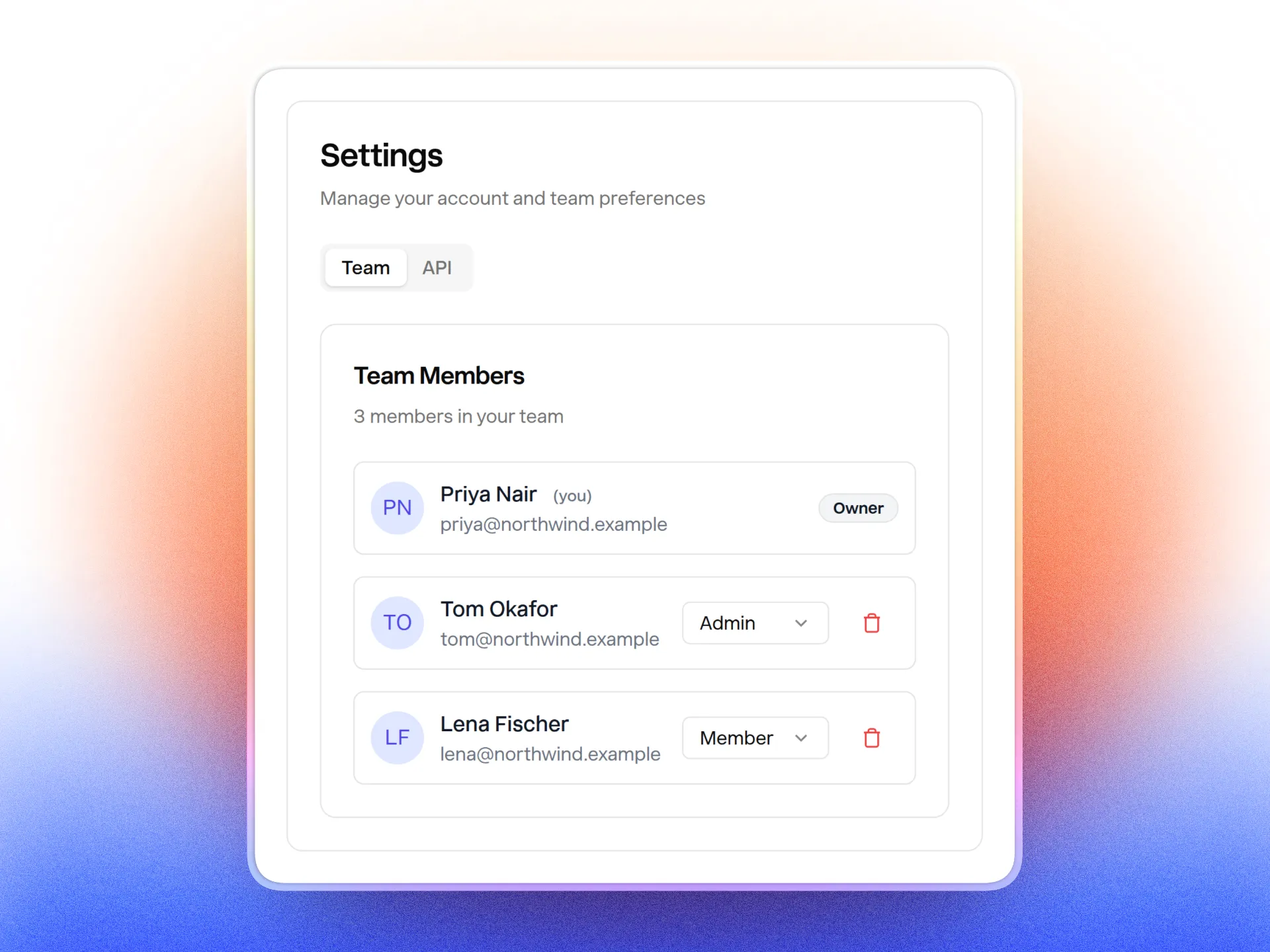 Settings → Team with a role dropdown next to each teammate